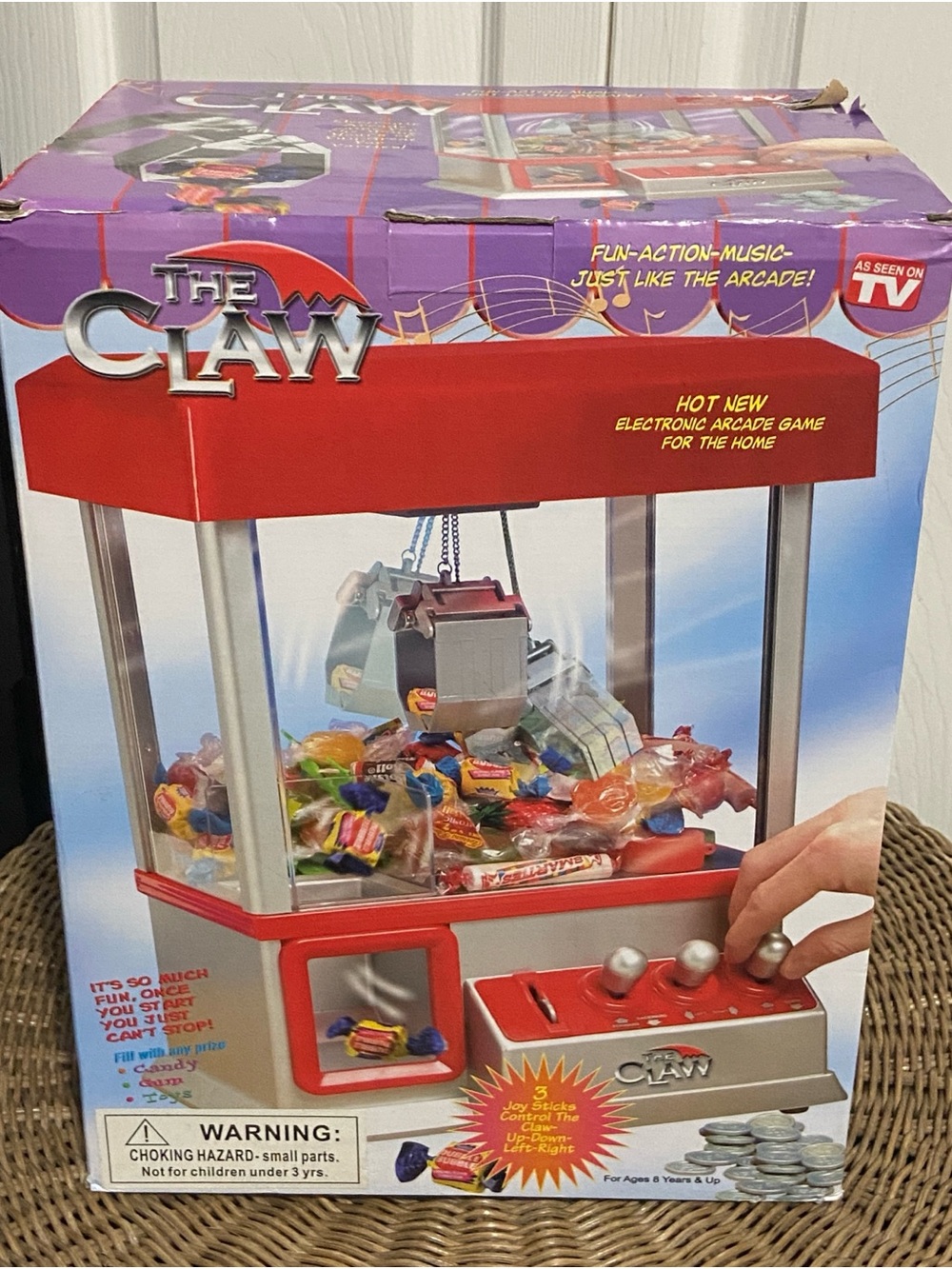 The Claw candy grabber machine